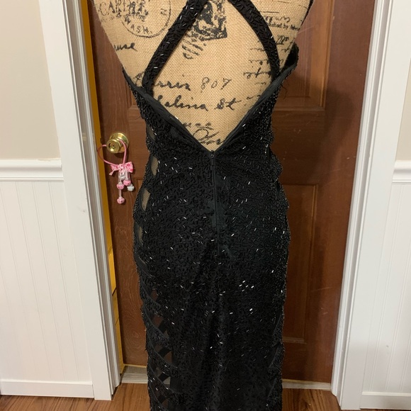 Celestial Radiance: Feathered and Beaded Mermaid Gown